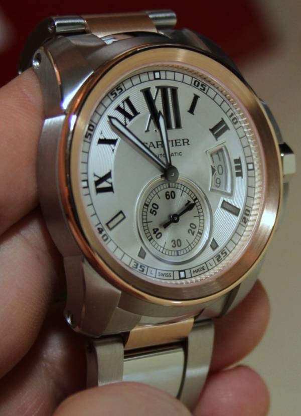 cartier calibre steel and gold