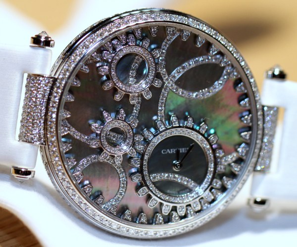 diamond encrusted cartier watch