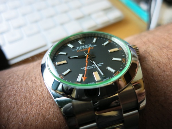 rolex with green glass
