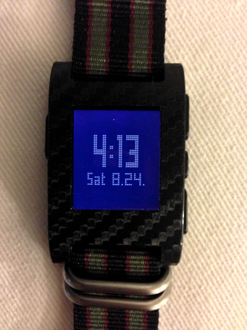 A third party face with Pebble's backlight on.