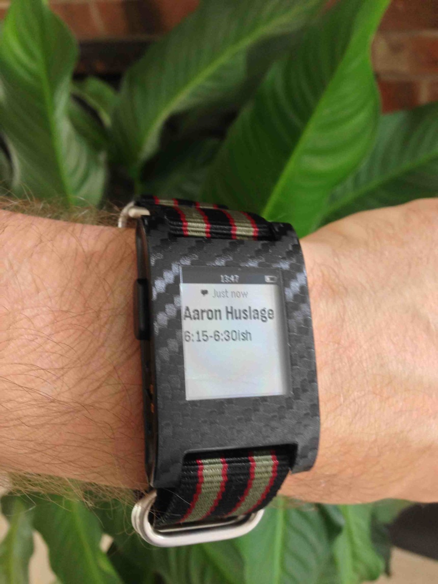 Pebble receives a text message and notifies the wearer at a glance.
