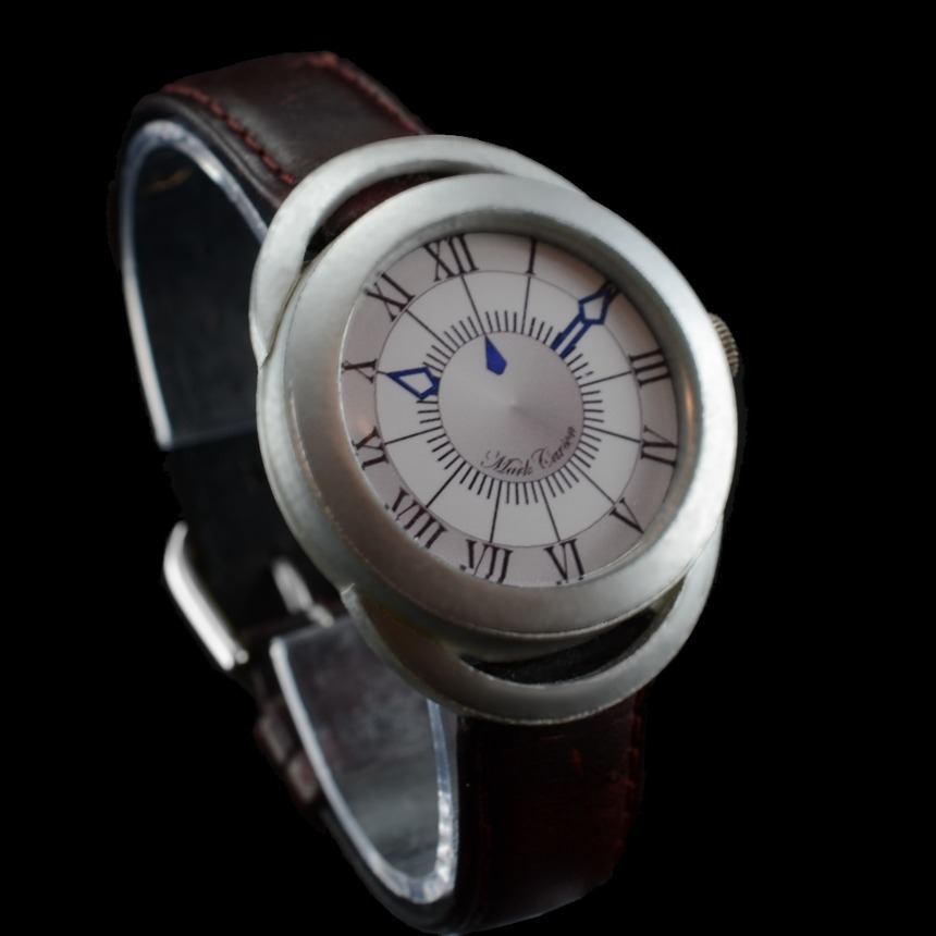 Plastic cased prototype with printed dial and hands.
