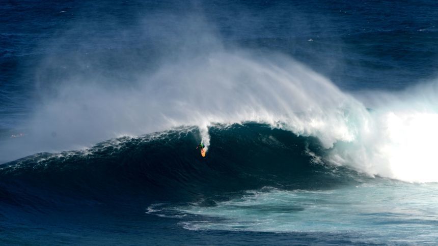 Kai Lenny surfing Jaws with a TAG Heier Aquaracer