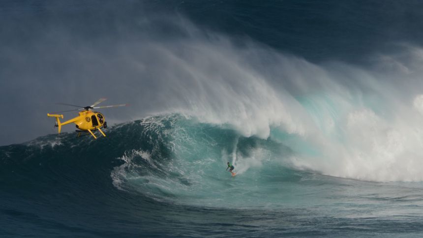 Kai Lenny surfing Jaws with a TAG Heier Aquaracer