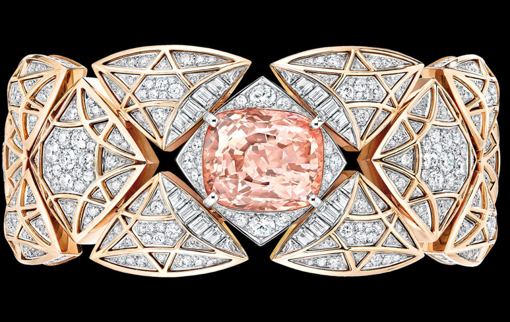 The Signature Saphir is centered by a 17.2-carat cushion-cut Padparadscha sapphire.