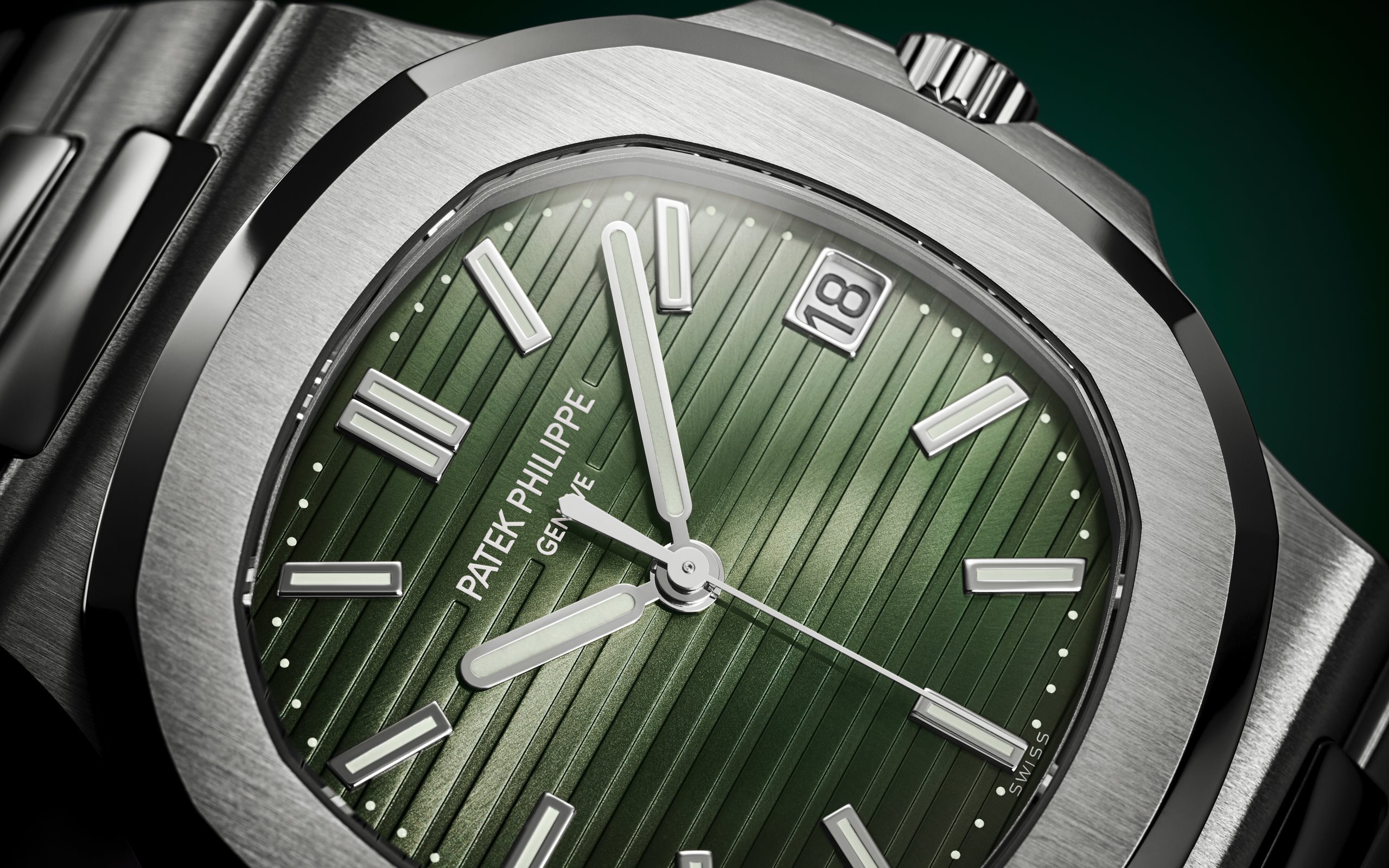 Three New Patek Philippe Nautilus Models (One Steel With A Blue Dial)